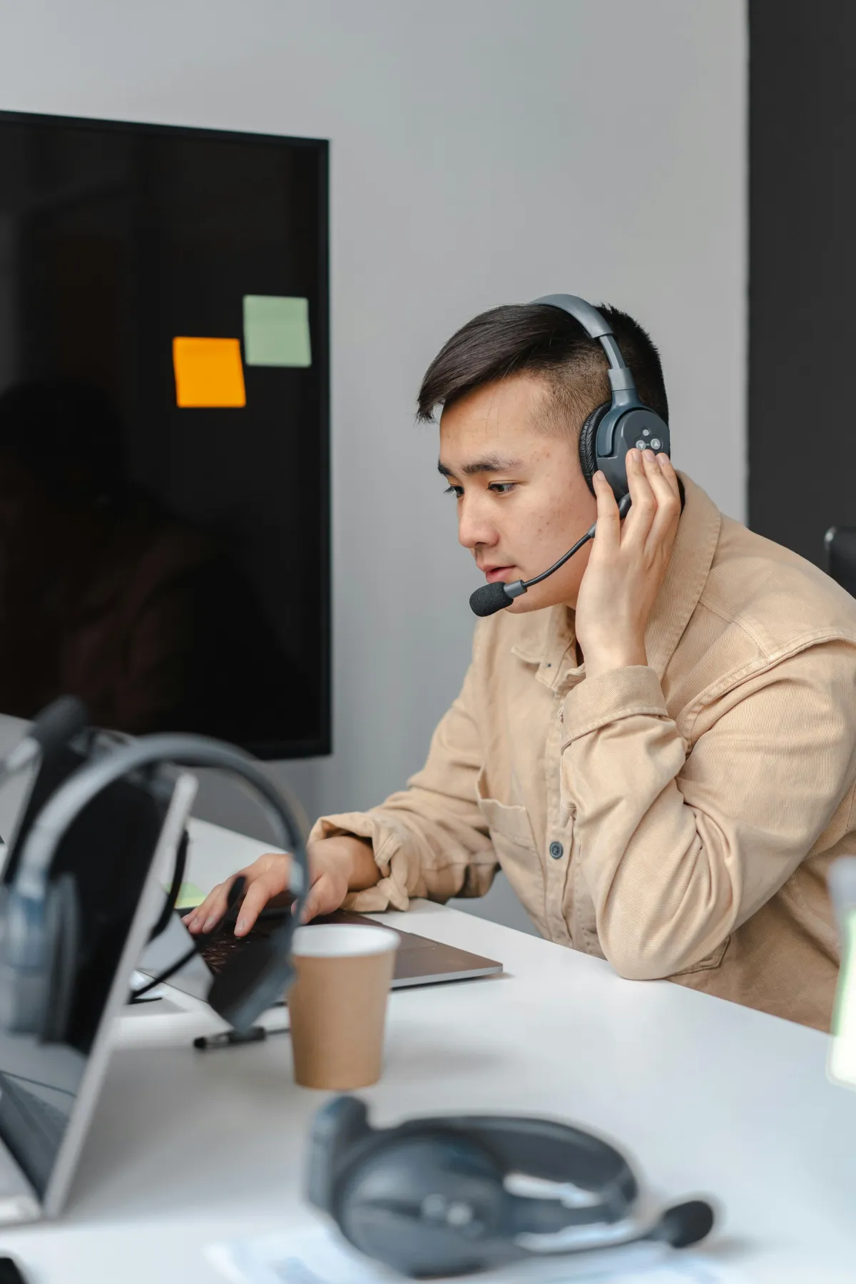 Virtual Assistant working at his computer for Author Anchor