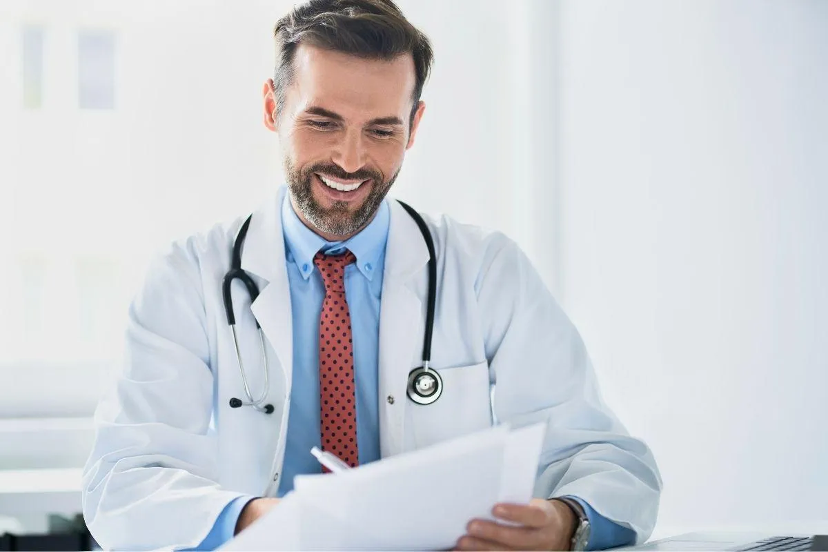 Doctor with paperwork