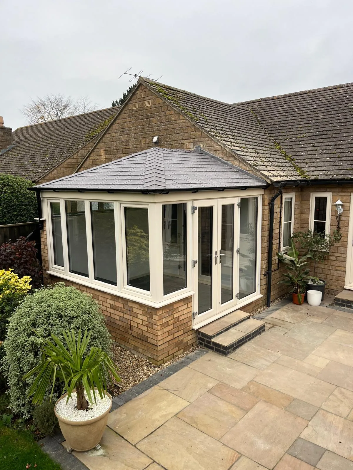  fully upgraded conservatory with an insulated, energy-efficient tiled roof, designed for improved temperature control and year-round comfort.
