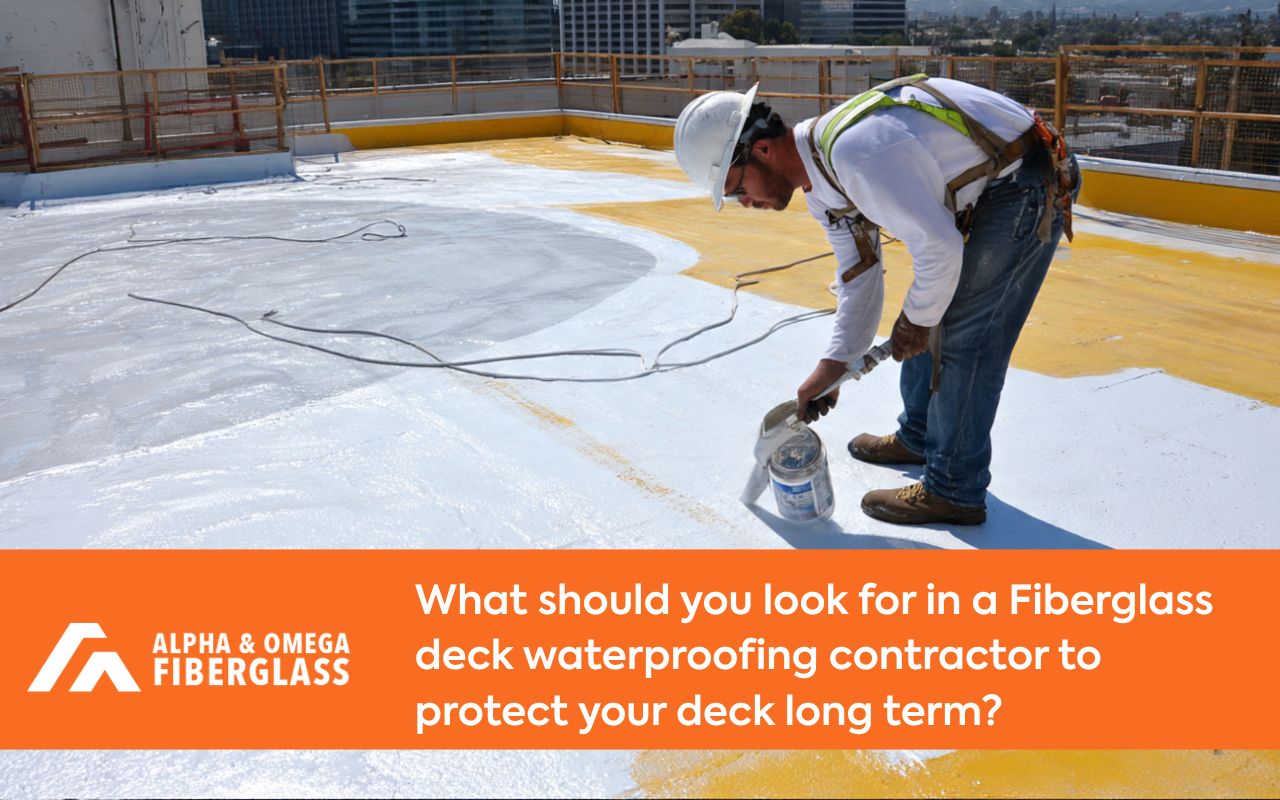 Fiberglass deck waterproofing contractor applying a slip-resistant surface finish