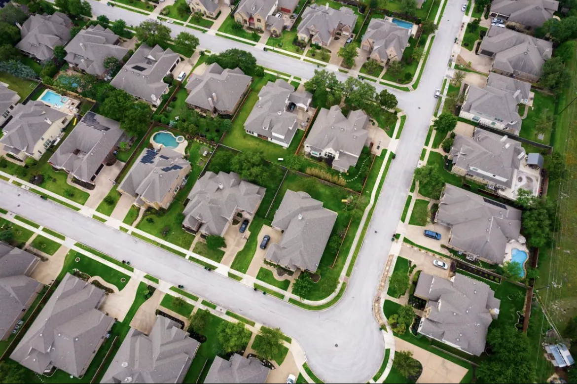 aerial view of homes in Round Rock Texas representing the local housing market and competition