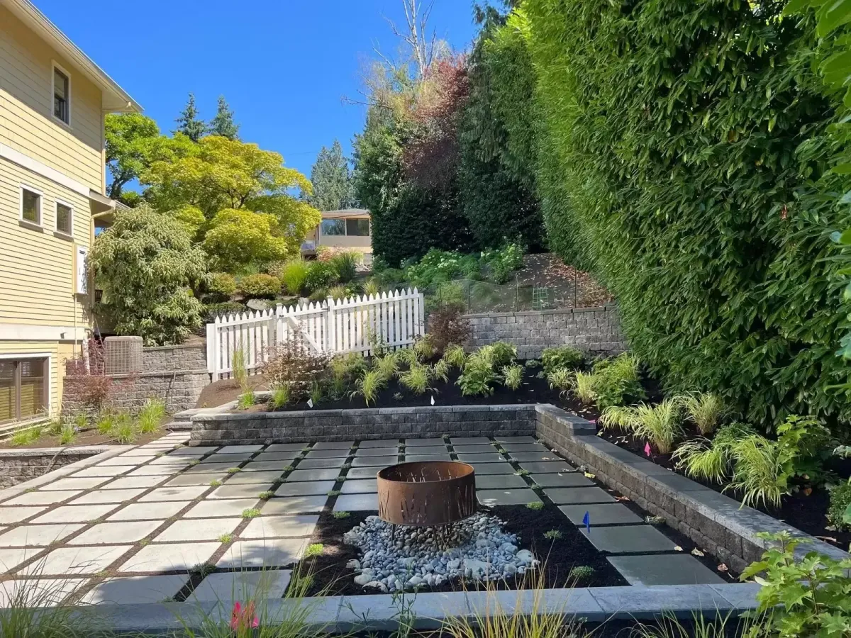 Paver Installation with Firepit in Backyard