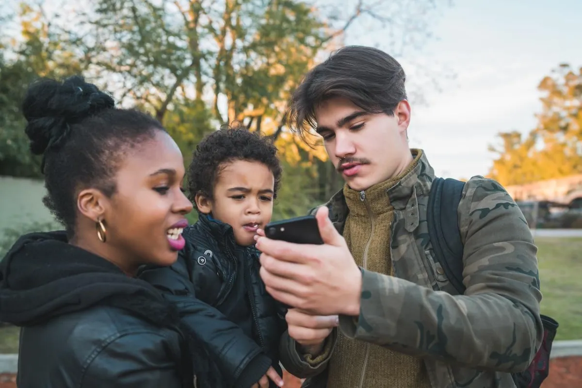 A family setting up digital identification tools to help prevent and protect their child in the event of an emergency.
