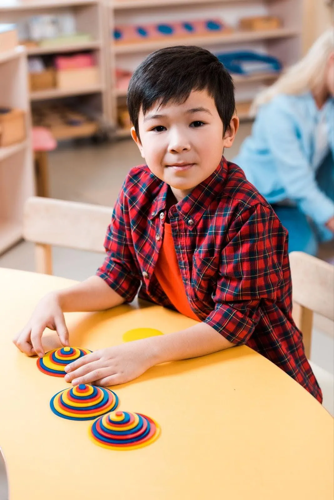 A child with autism sitting safely in his class, an example of who the National Autism Association is committed to protecting and who they can enhance their protection of by partnering with My Family ID.