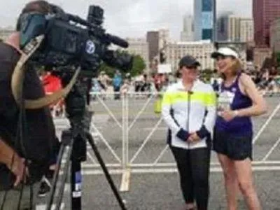 Katherine Switzer, Marathon Woman and charity partner being interviewed after a race