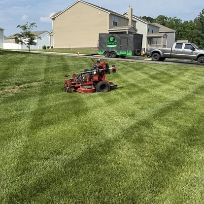 Brewer Lawn Care truck and equipment at Spring Hill TN property