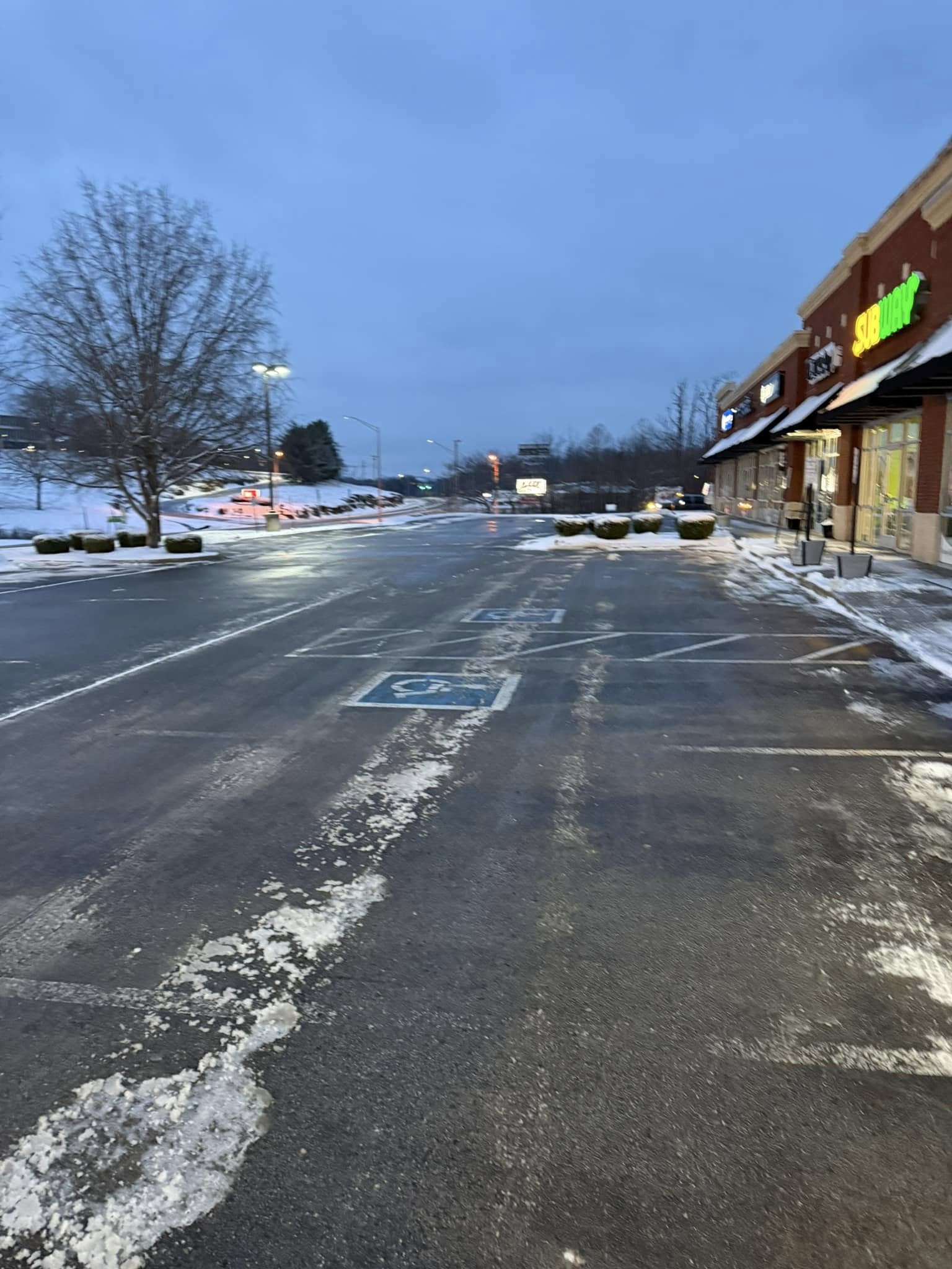 Commercial snow plowing Spring Hill parking lot - portfolio project
