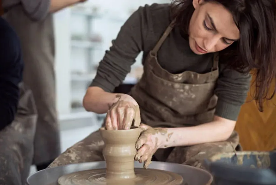 Woman at pottery wheel