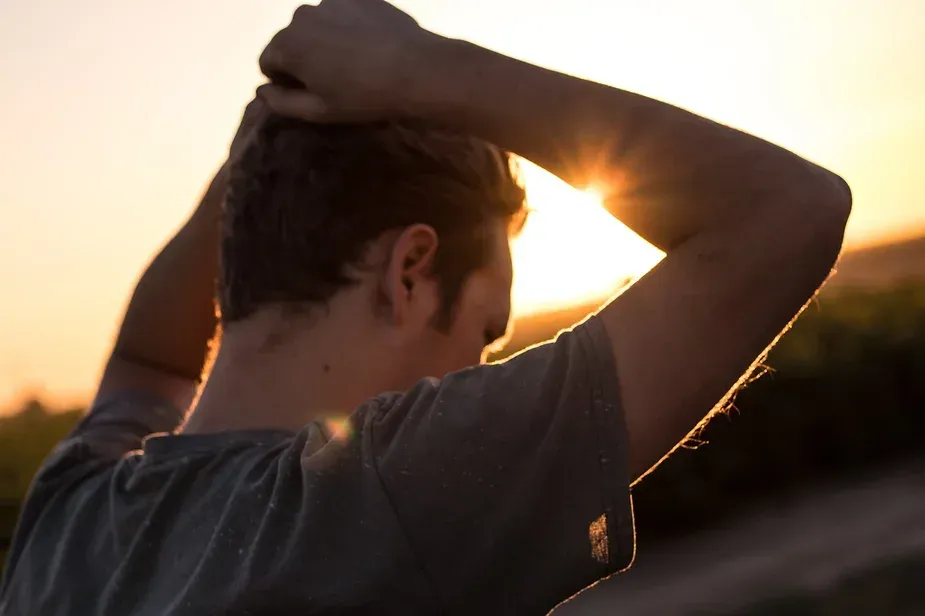 Man standing in the light