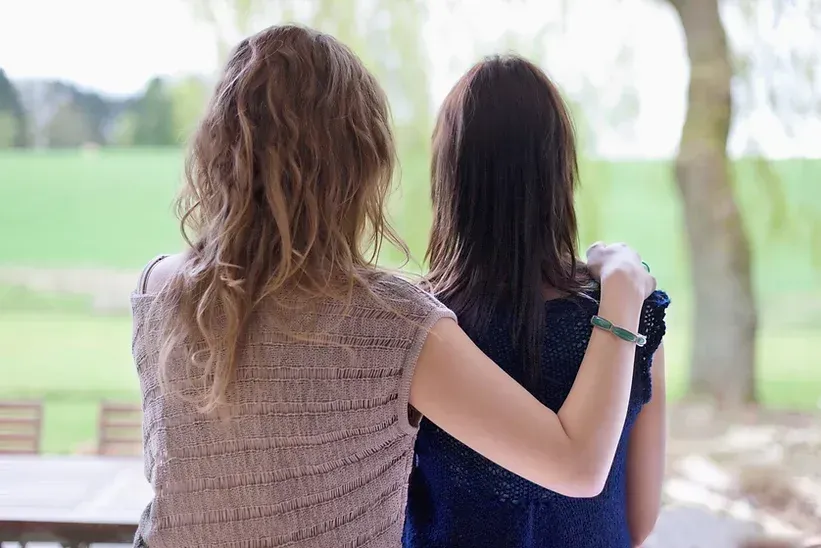 Women standing with each other