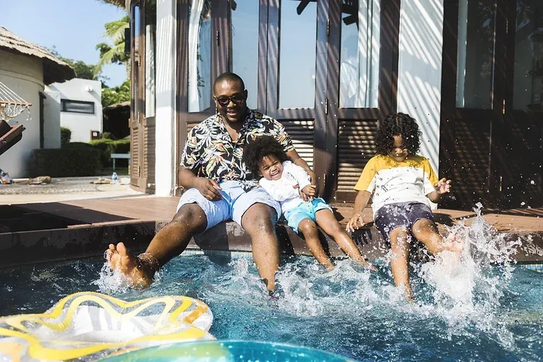 Family at edge of pool