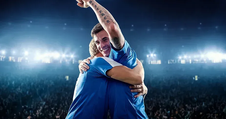 Triumphant men hugging