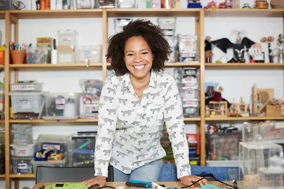 Woman in front of shelves