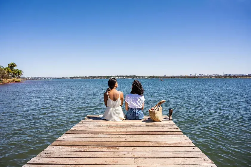 Two women on a dock