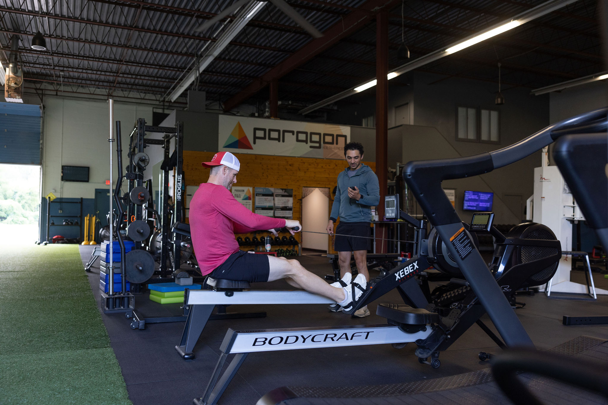 Rower machine with a personal trainer