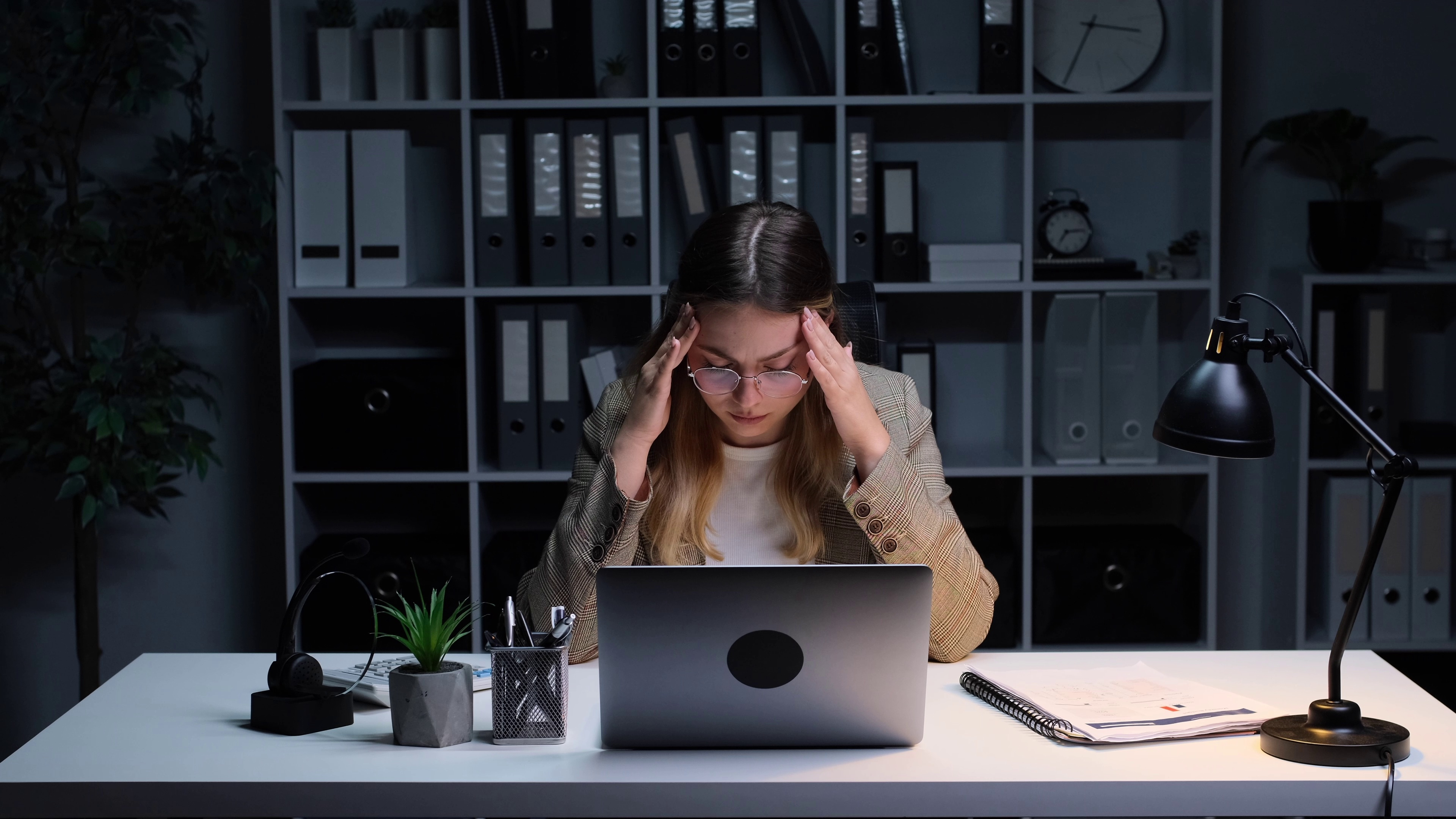 woman sitting in front of computer stressed