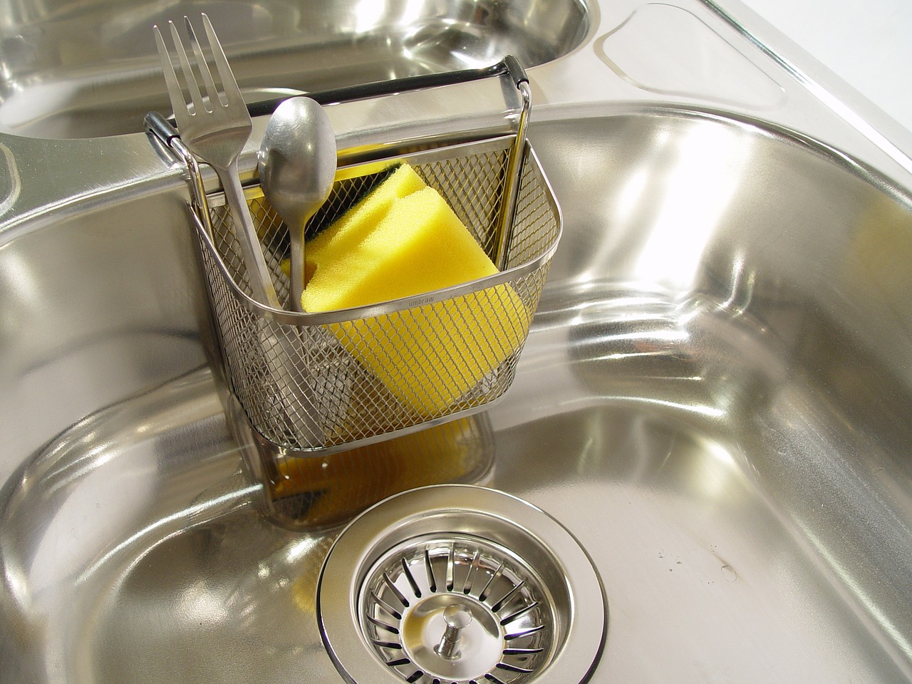 How to Clean Your Kitchen Sink, Drains, and Garbage Disposal