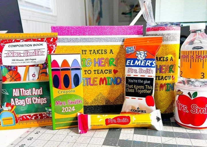 A collection of unique and colorful party favors including custom chip bags, personalized candles,  and pillows