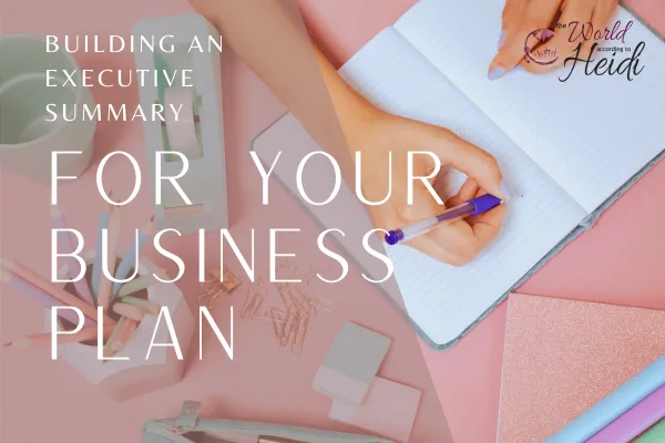 Hand writing on notebook with text "Building an Executive Summary for Your Business Plan"