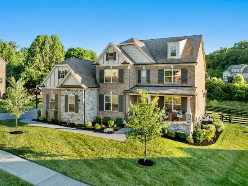 large home with green, healthy lawn in tennessee