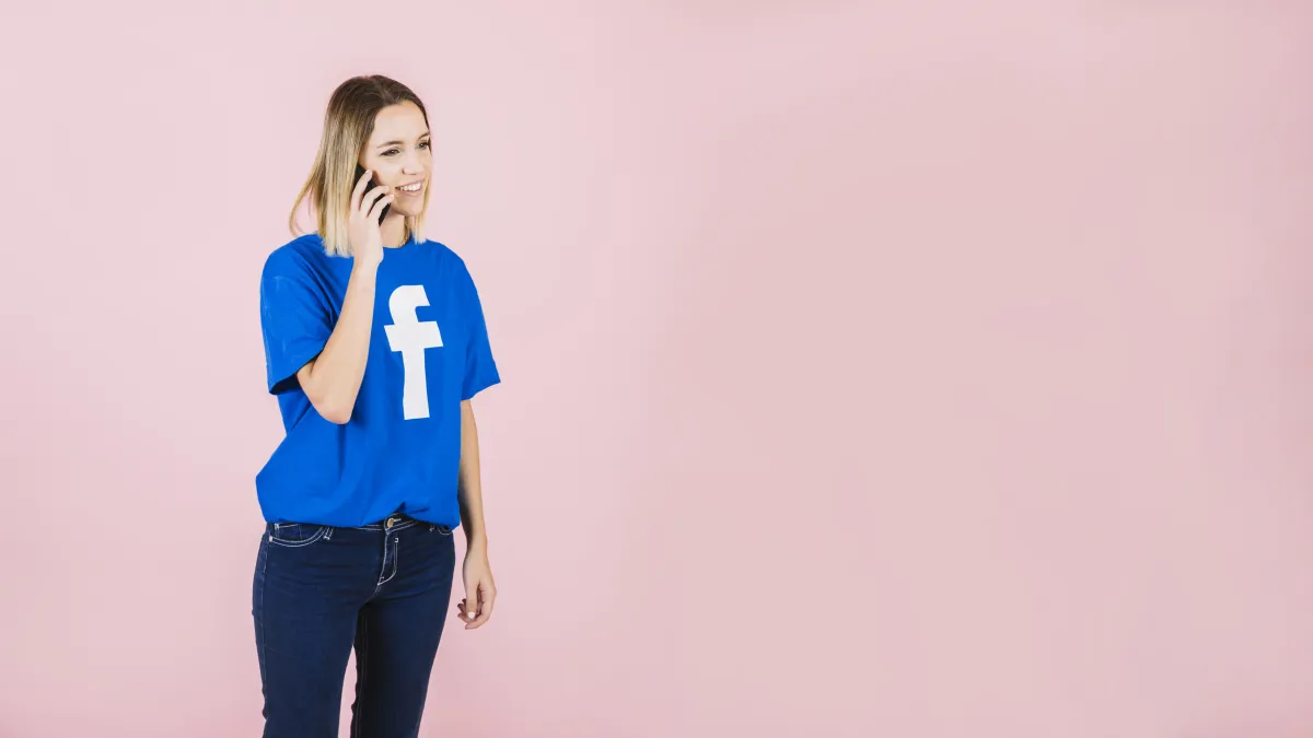 woman talking on the phone aplying facebook ads