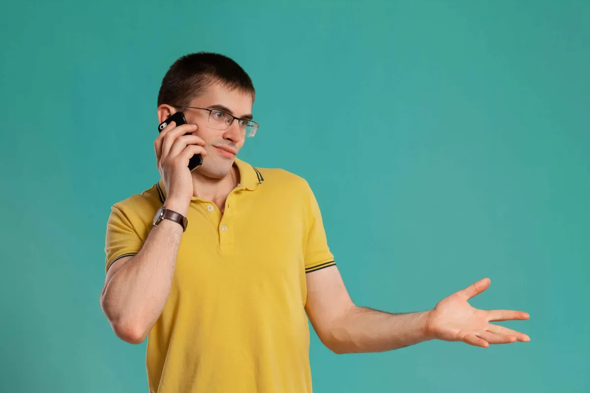 Man on the phone in an actionable pay per call campaign