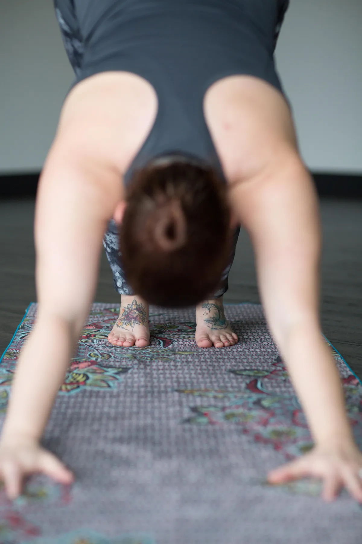 Margo in a classical Adho Mukha Svanasana (downward dog pose)