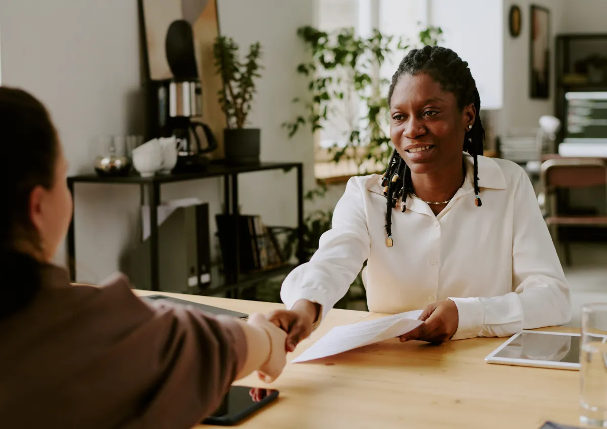 Individual with a disability working in an inclusive workplace with employment support