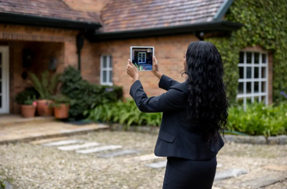 Realtor Creating a Virtual Tour of Home For Sale.