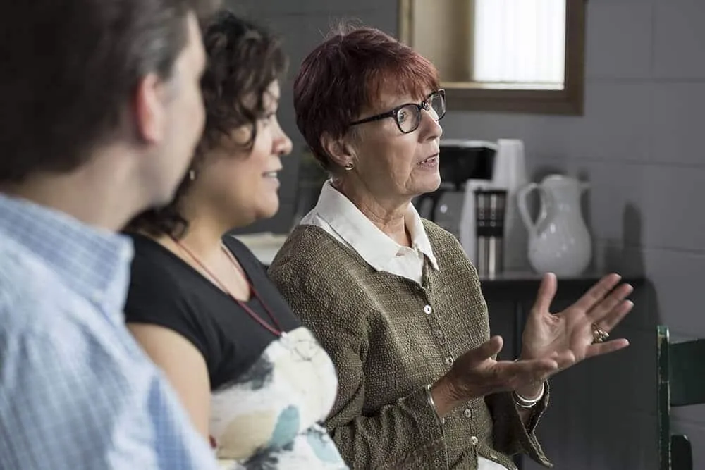 Women speaking to audience