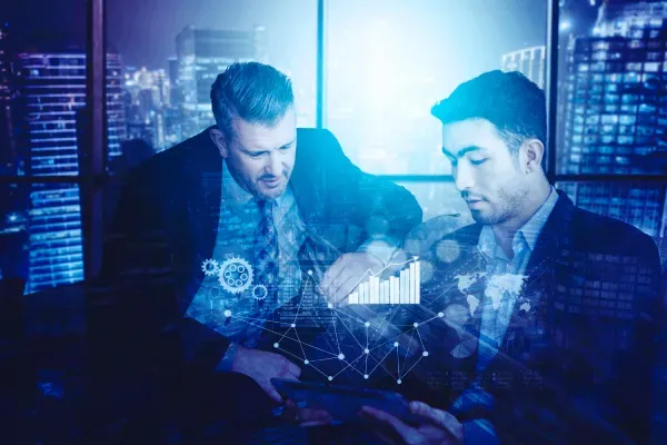 Adaptive AI visualized as an evolving neural network analyzing business data in real time, symbolizing intelligent systems that grow and adapt with organizational needs.