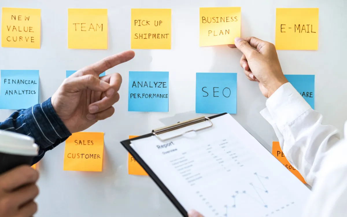 An image of two people conducting a business strategy session