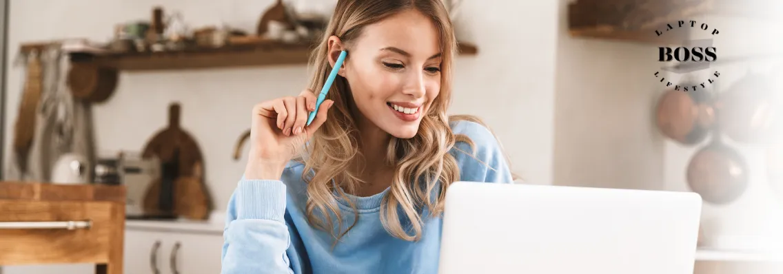 Woman Working on Laptop at Home