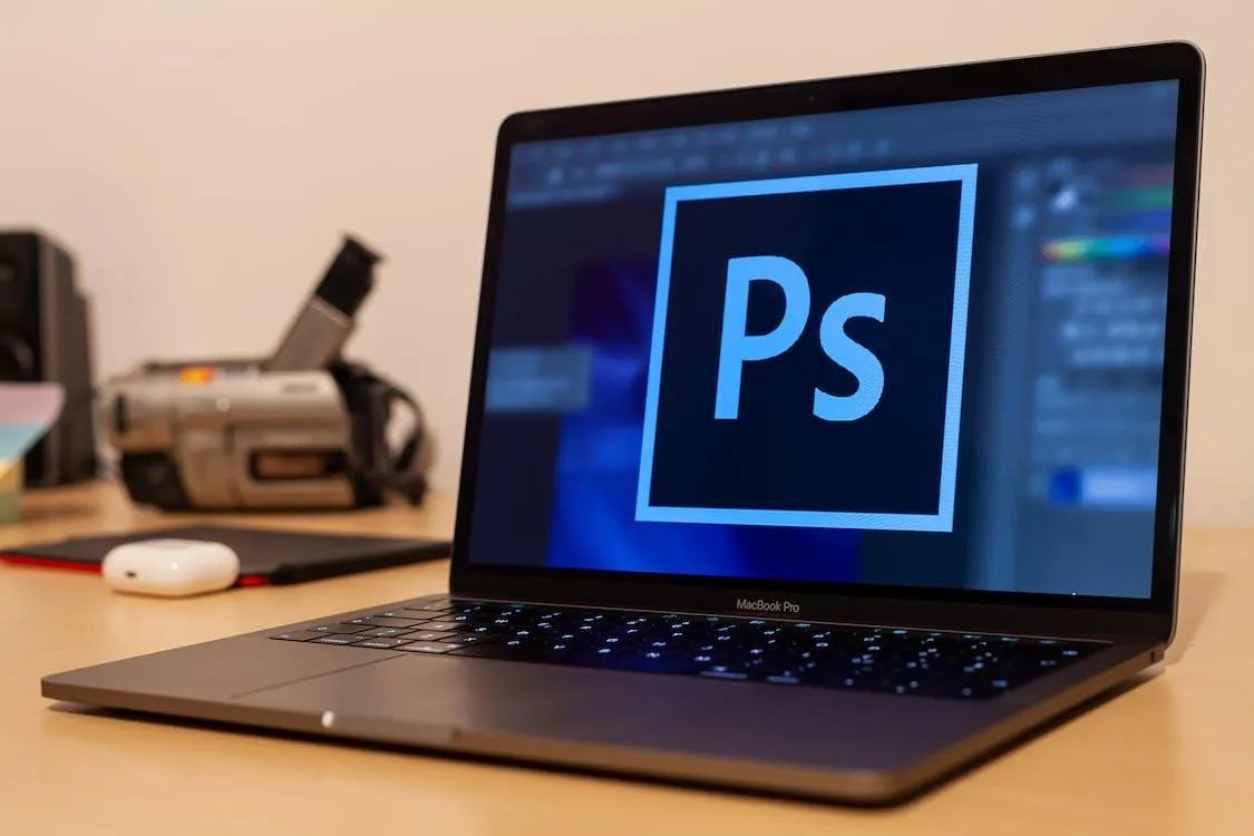 A formal depiction of Adobe Photoshop CS6 for Mac, showcasing the abbreviation 'ph' on the software box.