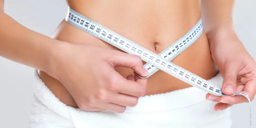 A syringe and a bottle of liquid for a weight loss injection