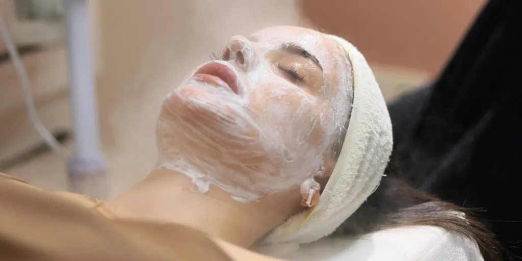 A woman undergoing a facial treatment