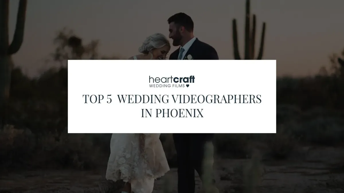 Bride and groom smiling together at sunset in the Arizona desert with saguaro cacti in the background, overlaid with the Heartcraft Wedding Films logo and the text “Top 5 Wedding Videographers in Phoenix.