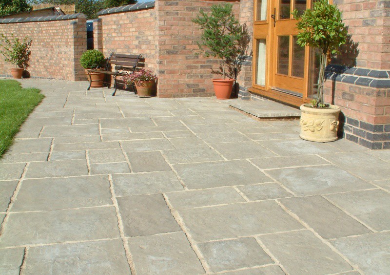 Sandstone paving for patio in Brixham with expert finish