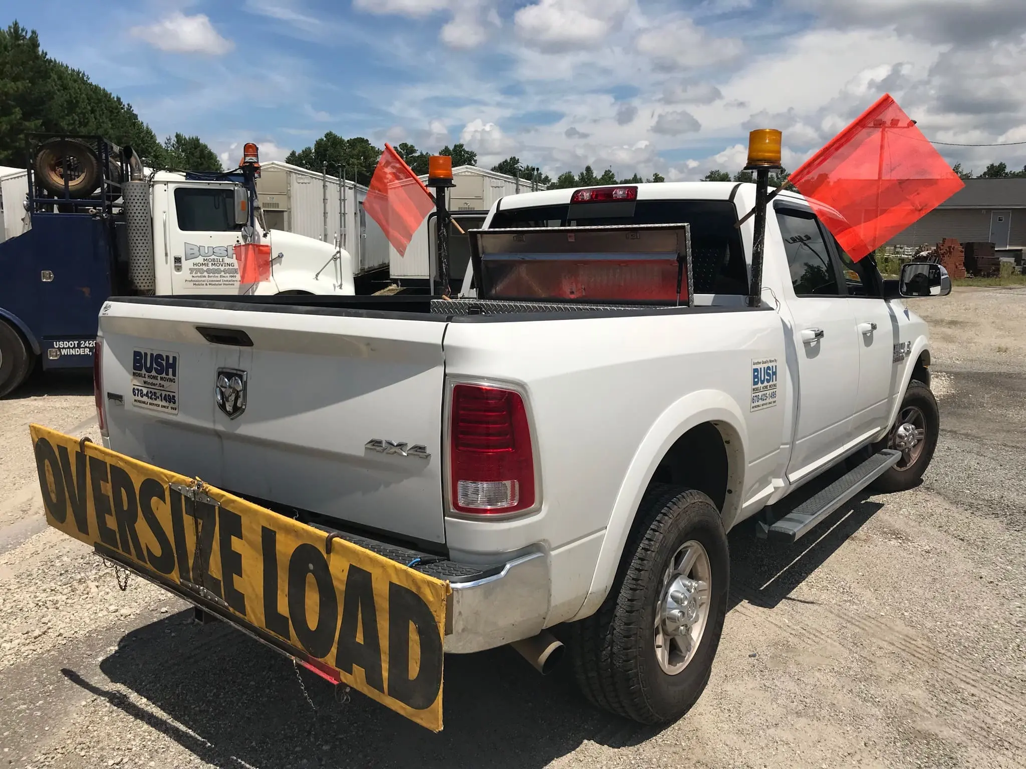 Oversize load trailer moving truck