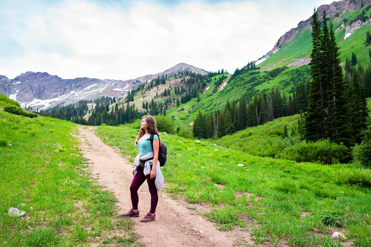 Woman on a mountain trail