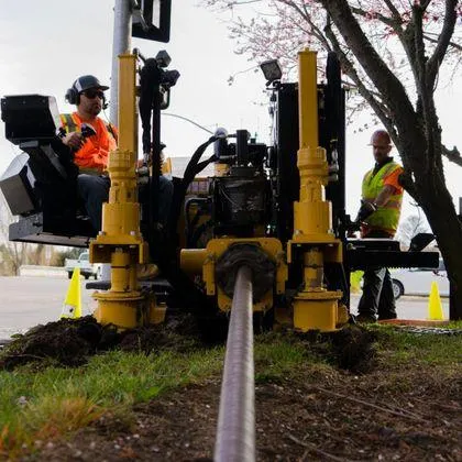 ATEX Services construction crew with heavy equipment supporting architecture and infrastructure projects in Texas and Colorado