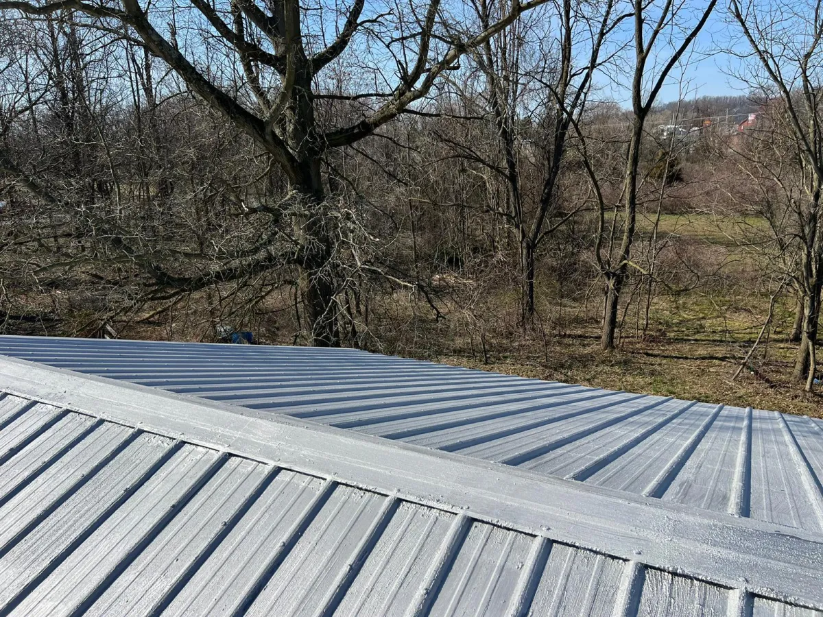 Metal roof with a new protective coating.