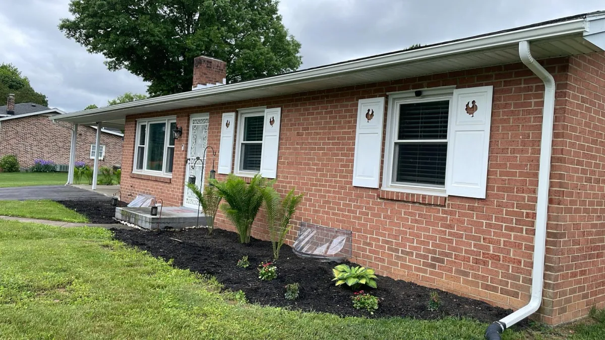 New seamless gutters installed on a house.