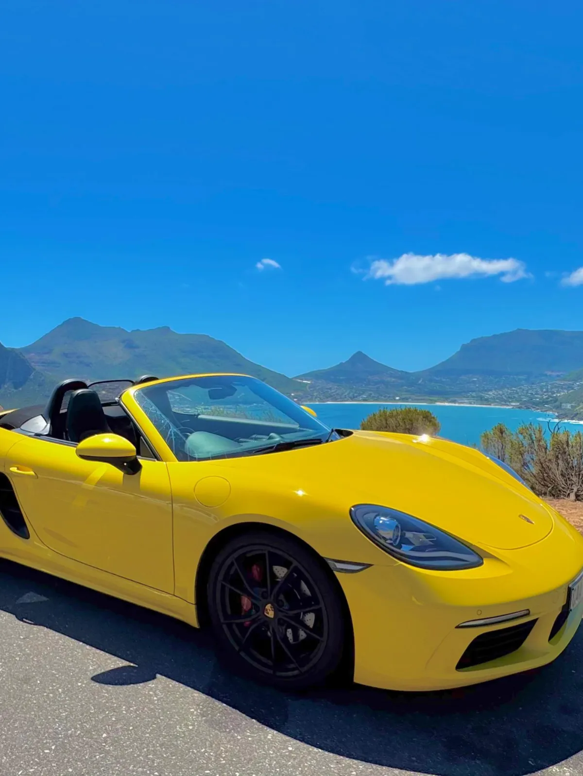 Porsche Boxster Ocnvertible driving Chapmans Peak Drive