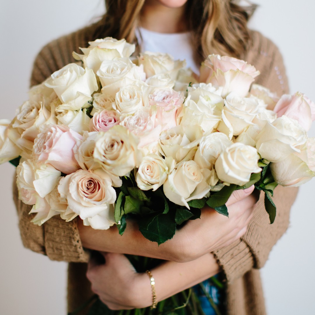 woman holding flowers