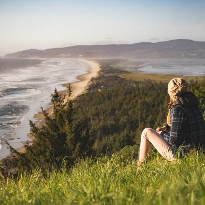 grieving woman looking at sea