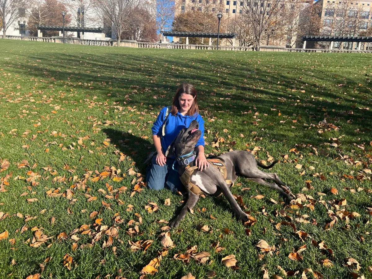 Woman and dog playing
