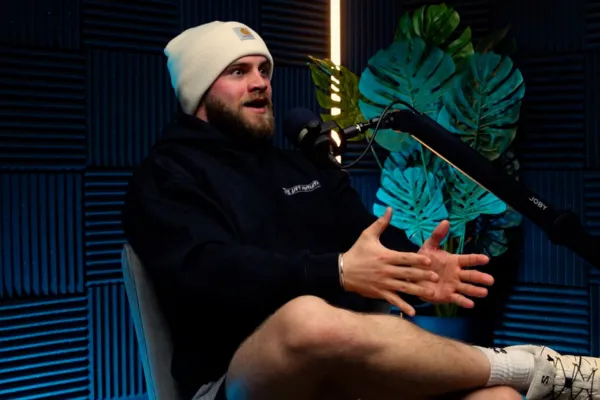 Man recording a podcast at Bulletproof Studios. 10 reasons to start a podcast.