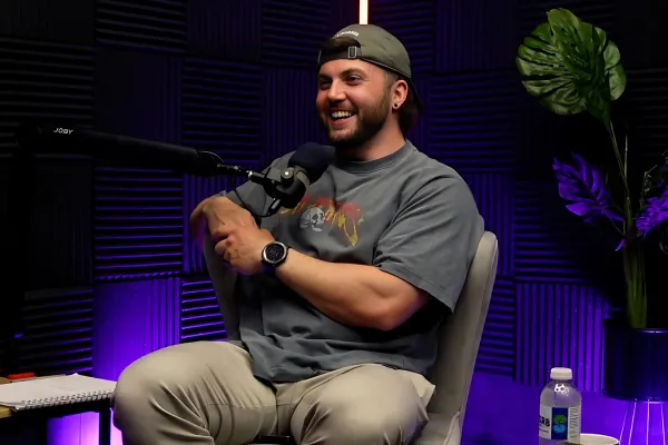 Man recording a podcast at Bulletproof Studios. 10 things I wish I new before starting a podcast.