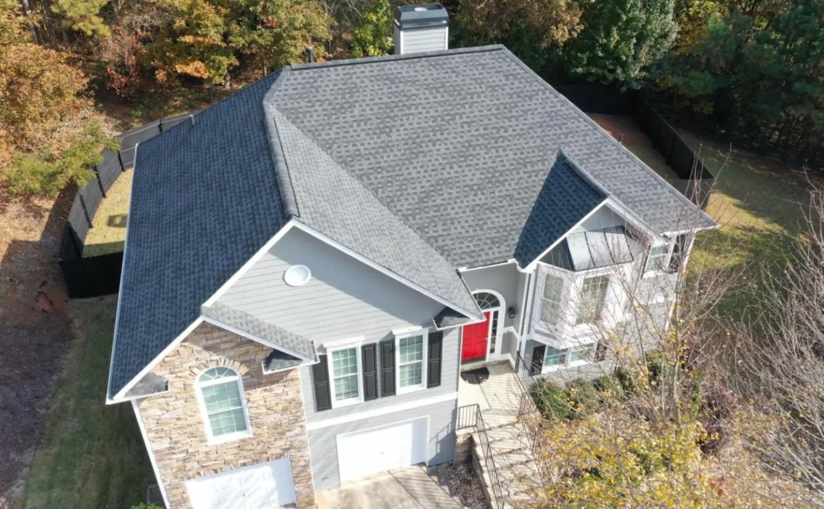 Completed asphalt shingle roof on two-story Denver home